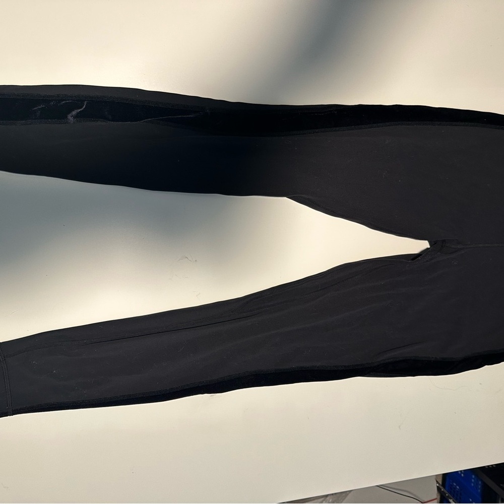 Women’s Black Lululemon leggings w/ velvet striped side size 10